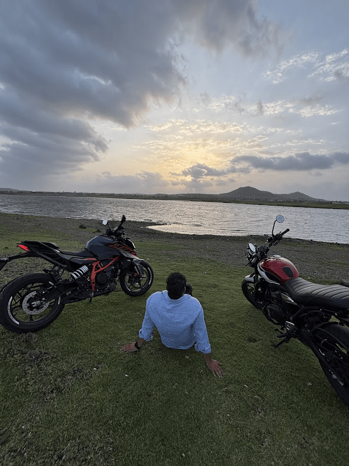 Motorcycle parked by a lake